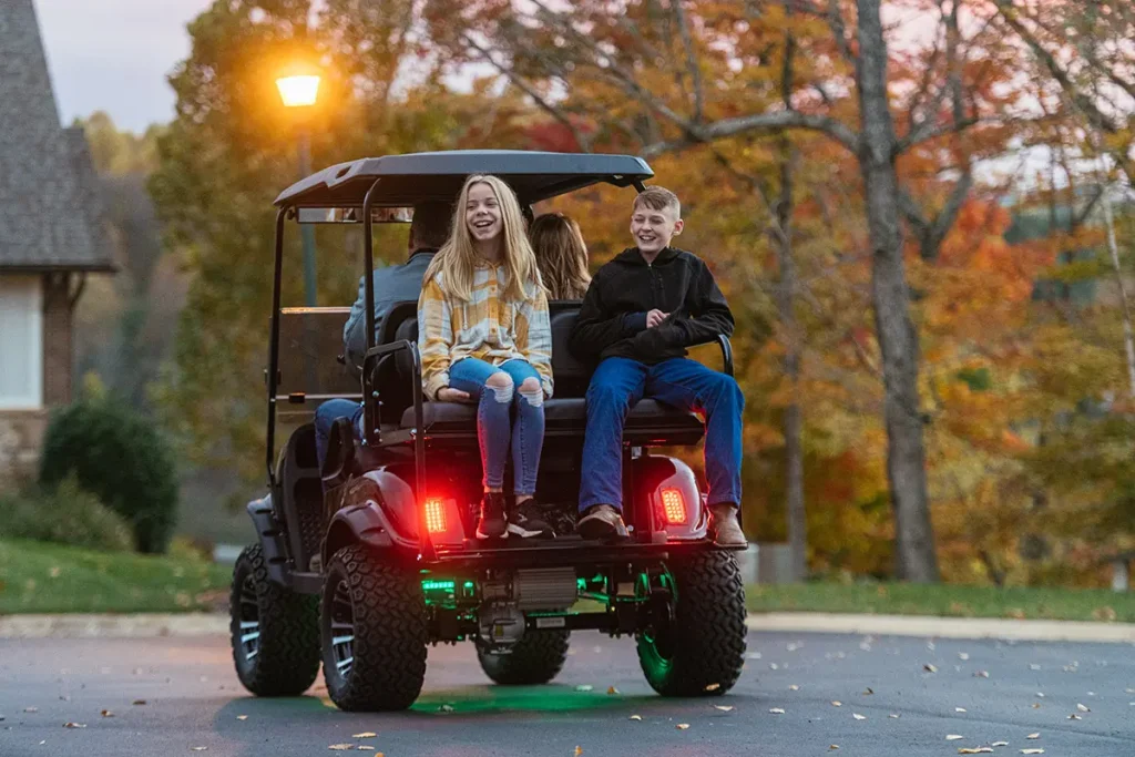 All-electric golf carts equipped with 7-color LED lights